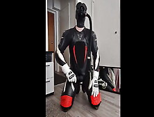 Guy In Dainese Bora Leather Suit And S10 Gas Mask Enjoys Two Vibrators And Shoots His Load Inside The Suit