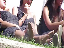 Five Gorgeous Brunette Hostesses Resting Their Candid Feet In Public