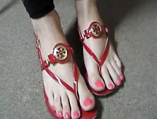 Red Flip Flops And Matching Toenails