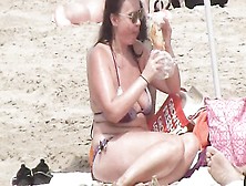Busty Mature Lady Has A Lunch On The Beach