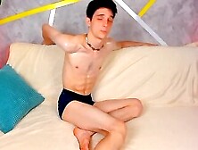 Very Muscular Twink Tied To A Couch