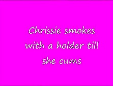 Chrissie Smokes With A Long Holder While Masturbating For You