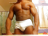 Upclose Huge Bodybuilder Flexing In White Briefs