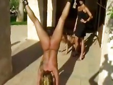 Women Tied Upside Down And Whipped