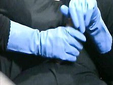Smokin' Wife In Blue Rubber Gloves Causes A Large Spunk Fountain