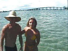 Bikini Girl Gives Him A Blowjob In The Ocean