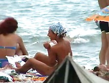 Buxom Nude Beach Babes Flaunt Their Jugs Before A Hidden Camera