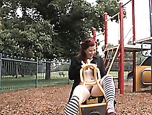 At The Park,  She Squats Low And Rubs On Her Hairy Pussy
