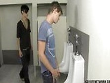 Twink Is Caught Looking At Cock In School Bathroom