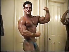 Bodybuilder Does His Routine In Front Of The Camera