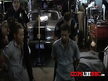 Two Horny Police Officers Get To The Mechanic Just To Fuck Him Hard With His Massive Black Cock.