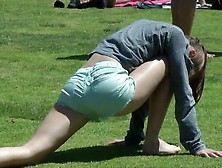 Beautiful Girl Does Yoga In The Park