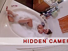 Hidden Camera Stacked Milf Plays With Wet Pussy In The Bath