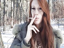 Red Haired Smokes Inside The Forest