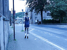 Crossdressed In Uniform Outdoors On A Main Road