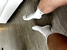 Sock Jock Removing Shoes After Long 8 Work Day