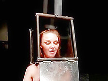Bdsm Babe With Head In Steel Box Spaked