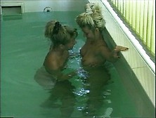 2 Erotic Blonde Lesbians Get Off In Pool