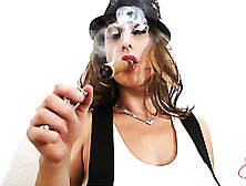 Big-Titted Milf In A White Vest,  Skirt And Hat Smoking A Long Cigar While Seducing A Dude
