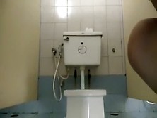 Thai Teen Using Public Toilet