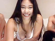 Asian Babe Has Fun With Two Big White Cocks
