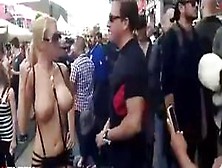 Girl Shows Crowd Her Big Boobs