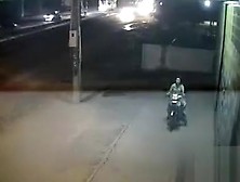 Female Motorcyclist Gets Caught On Security Cam Urinating
