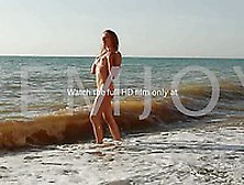 Naked Bimbo Sandy C Has Stretched The Perfect Body In The Warm Sea Waves