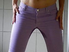 Wetting Her Purple Pants