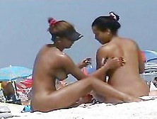 Chicks With Natural Boobs Sunbathing On The Beach