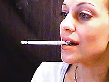 She Smokes Close Up On Webcam