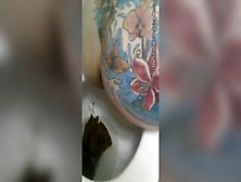 Horny Tattooed Ass Girl Poops In The Toilet
