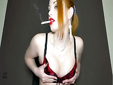Russian Redhead Smoking Whilst Playing With Oiled Tits