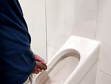 Risky Urinal Wank And Cum