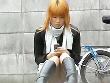 Stunning Colorful Admirable Chick Messing With Her Phone During Sharking Scene
