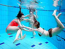 Three Nude Girls Have Fun Underwater