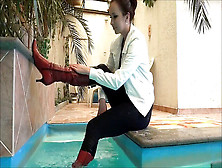 Female Play In Pool In Jacket And Shoes