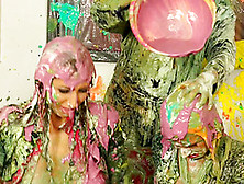 Naughty Trio Of Sexy Lesbians Get Messy Applying Color On Themselves Nicely