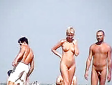 Horny Couple Is Caving Fun On The Nudist Beach