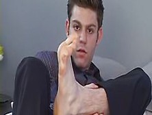 Sexy Businessman Showing Off His Perfect Toes