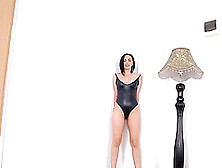 Stunning Brunette Babe In Black Bikini Standing In Corner Of Her Room With Vibrator
