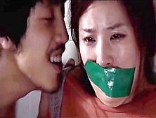 Two Korean Women Tape Gagged
