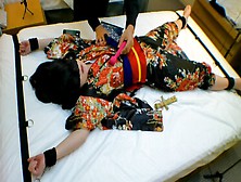 Kimono Cosplay Blindfolded Bitch Is Restrained In Bed And Tampered With Nipples