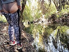Milf Dressed In Leggings Pissing In The River