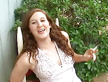 Cigarette Smoking Teen Has Lots To Say As She Relaxes Outdoors