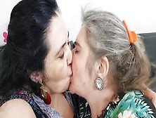 Two Mature Kissing