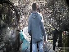 Caring Boyfriend Covers Up Girl Peeing In The Shrub