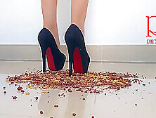 Cornfalkes Destroying With High Heels Boots On The Floor