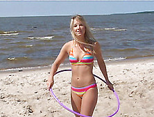Bikini Teen Strips On The Beach And Hula Hoops In The Nude