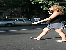 Short Skirt Of A Hot Blonde Invites A Street Voyeur